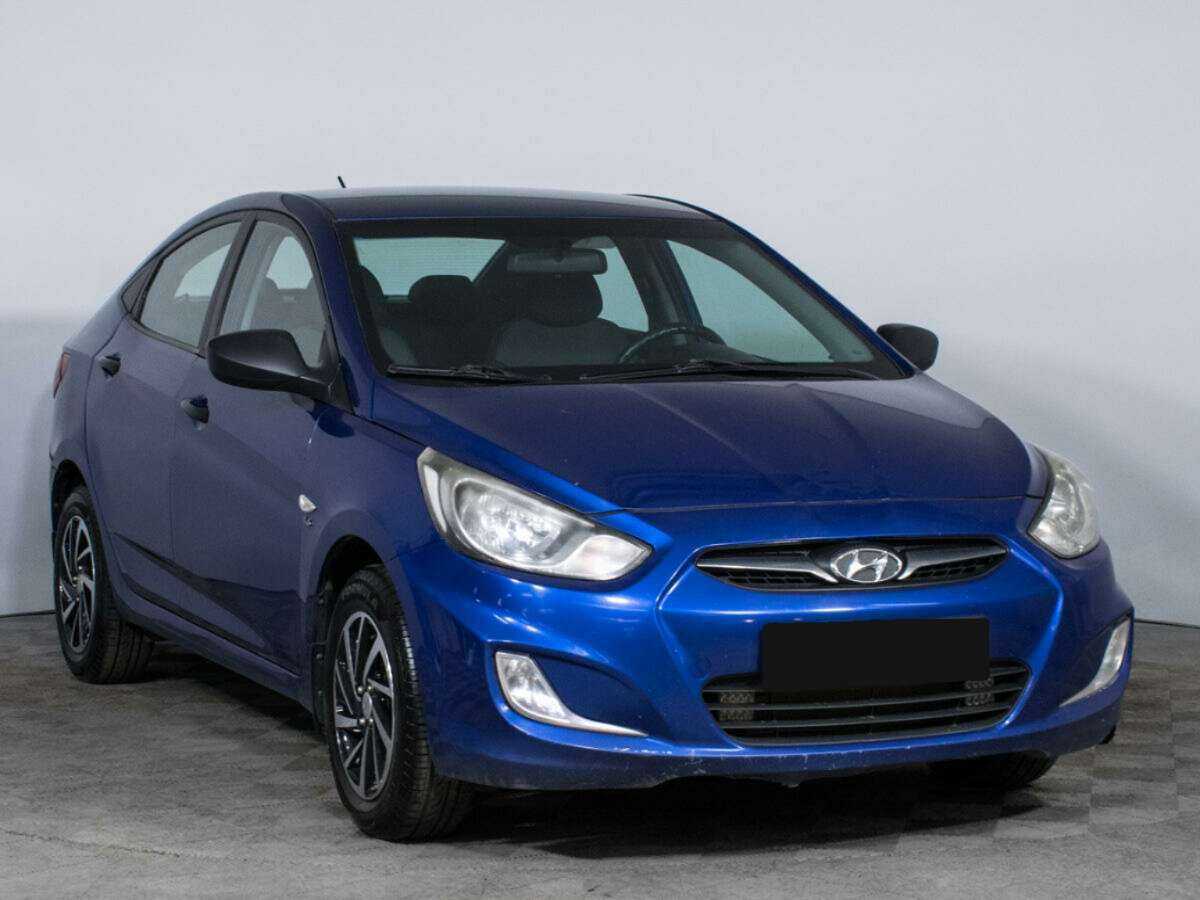 Hyundai Solaris с пробегом — 2012 год. Фото: #2