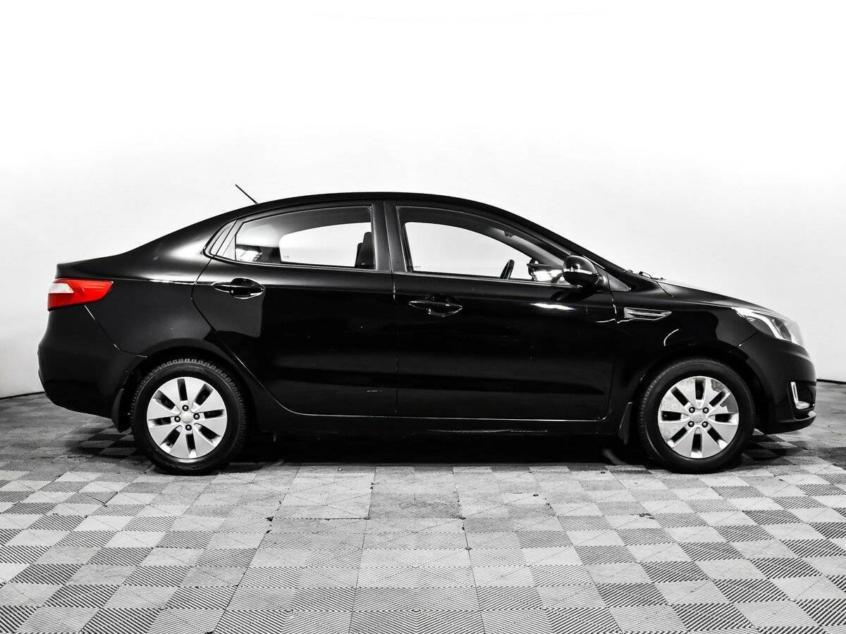 Kia Rio с пробегом — 2012 год. Фото: #3