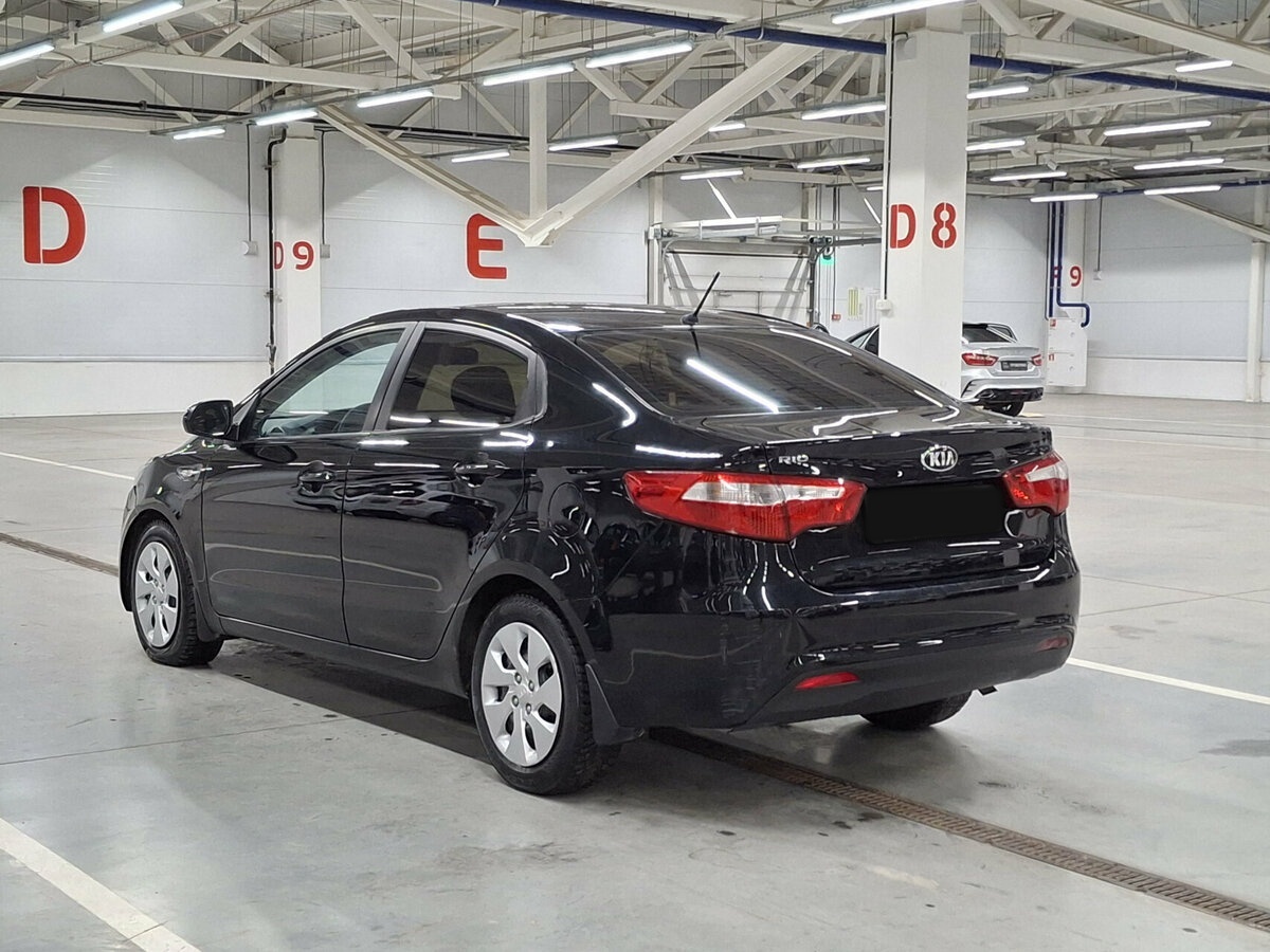Kia Rio с пробегом — 2014 год. Фото: #6