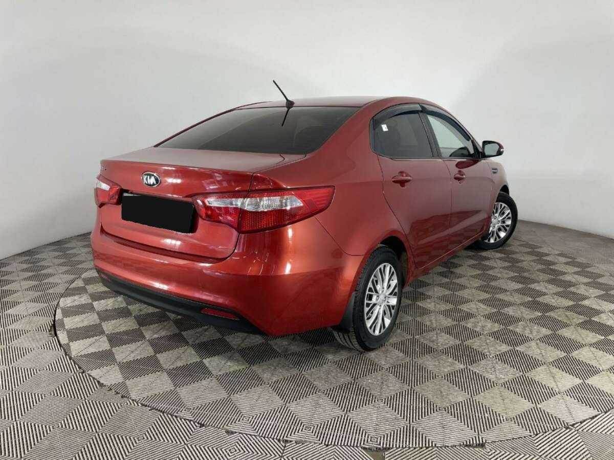 Kia Rio с пробегом — 2013 год. Фото: #5