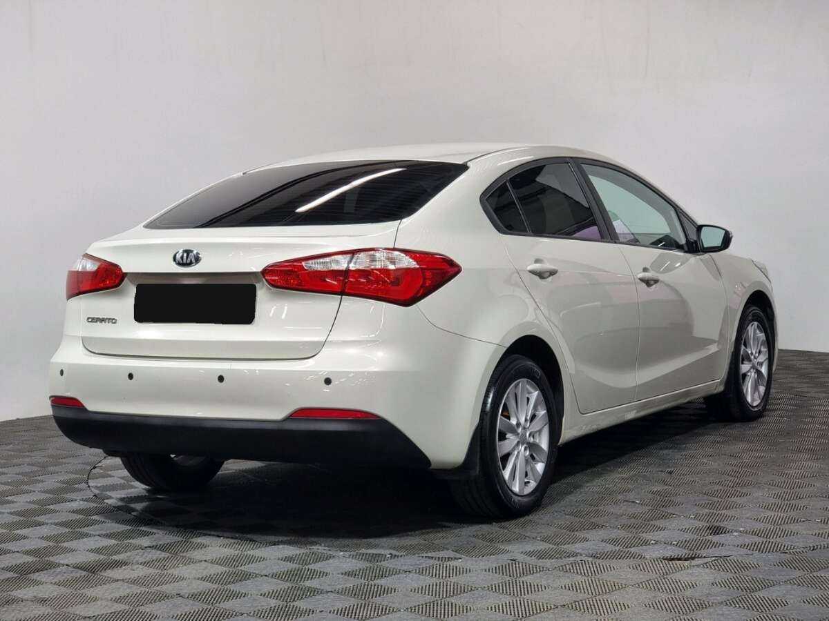 Kia Cerato с пробегом — 2014 год. Фото: #2
