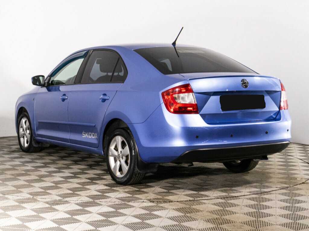 Skoda Rapid с пробегом — 2014 год. Фото: #6