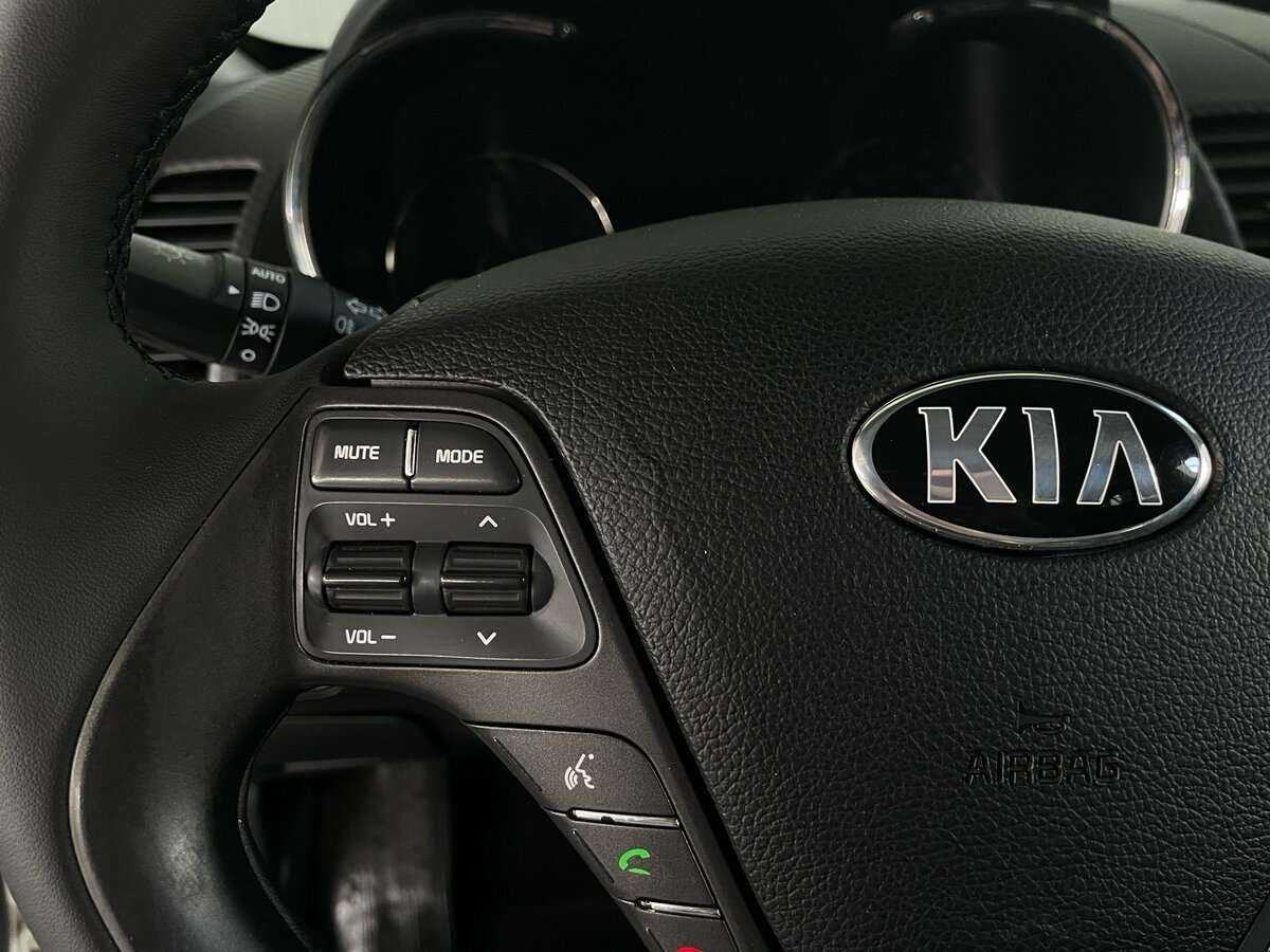 Kia Cerato с пробегом — 2014 год. Фото: #11
