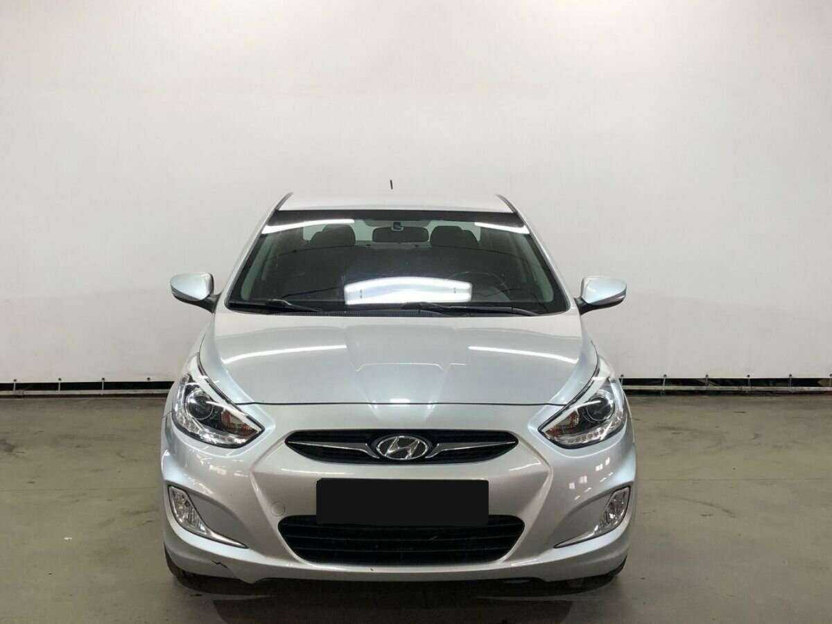 Hyundai Solaris с пробегом — 2014 год. Фото: #1