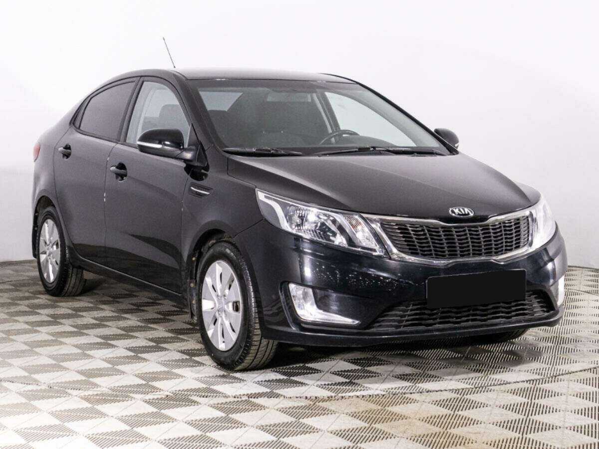 Kia Rio с пробегом — 2014 год. Фото: #2