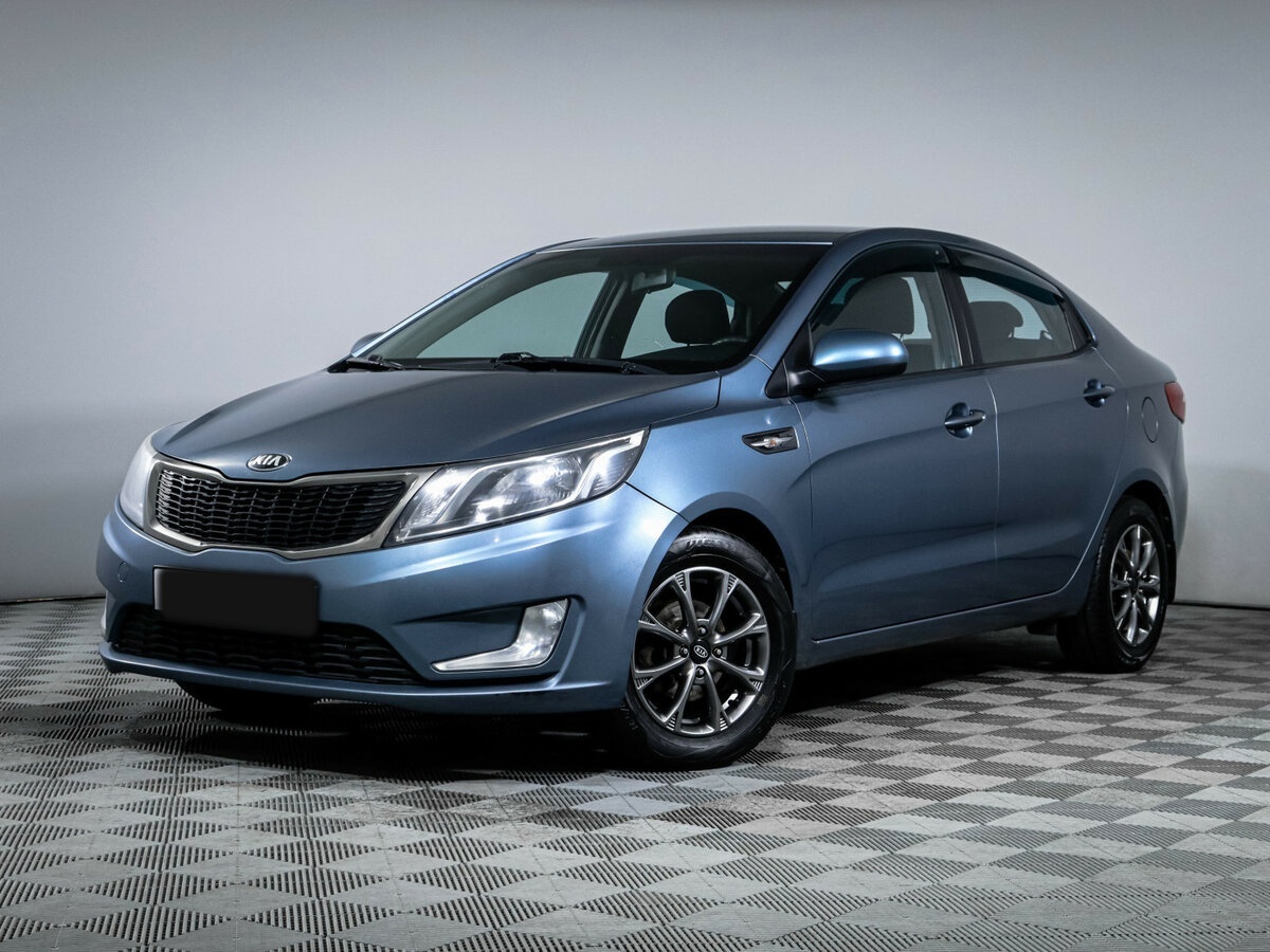 Kia Rio с пробегом — 2013 год. Фото: #0