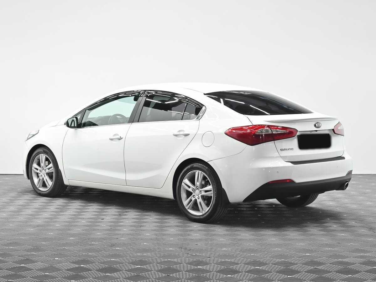 Kia Cerato с пробегом — 2013 год. Фото: #3