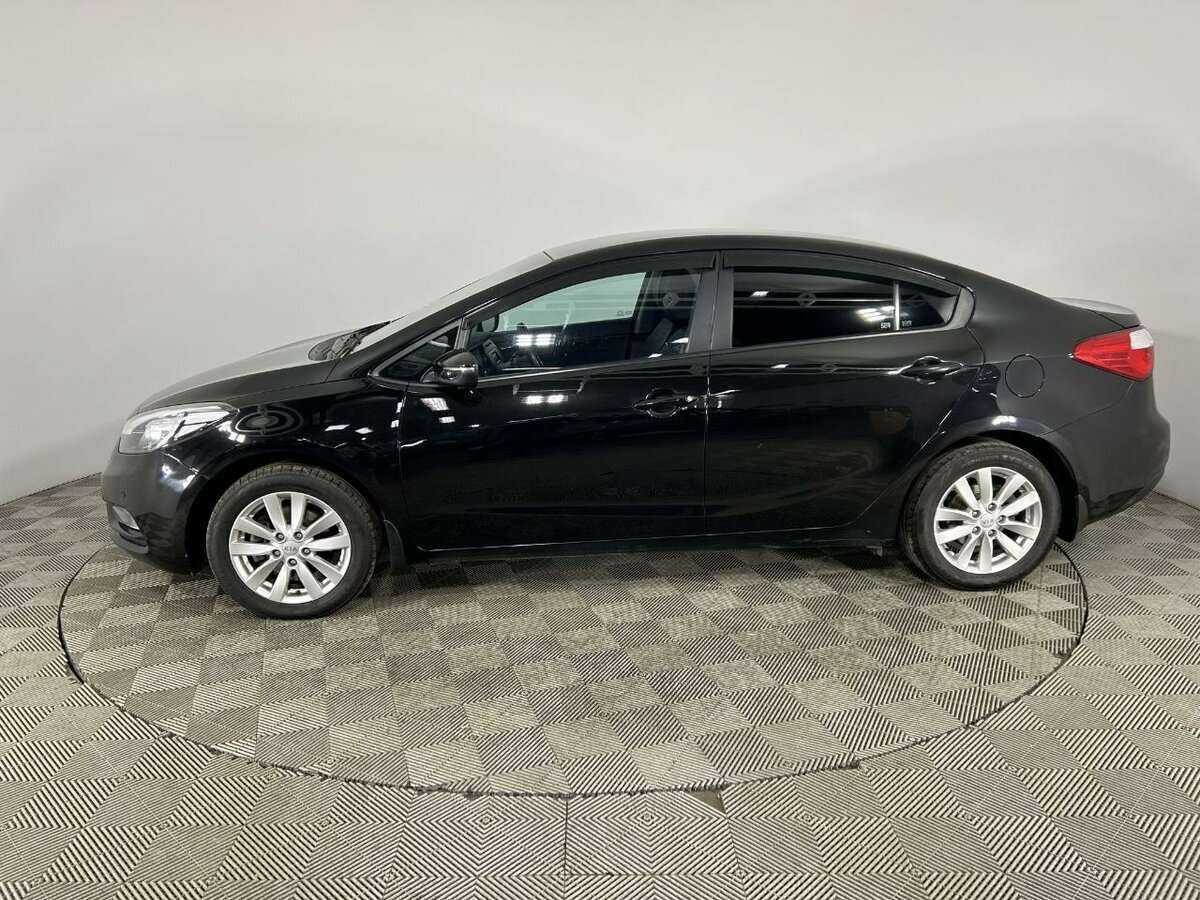 Kia Cerato с пробегом — 2014 год. Фото: #4