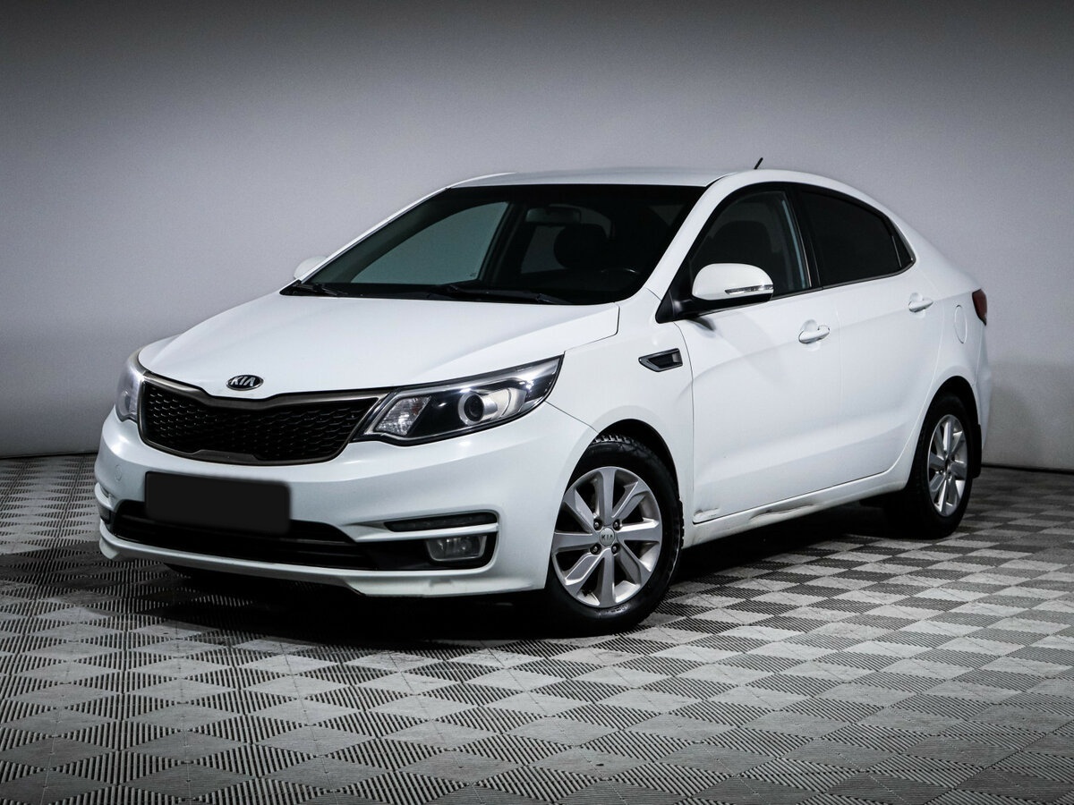 Kia Rio с пробегом — 2015 год. Фото: #0
