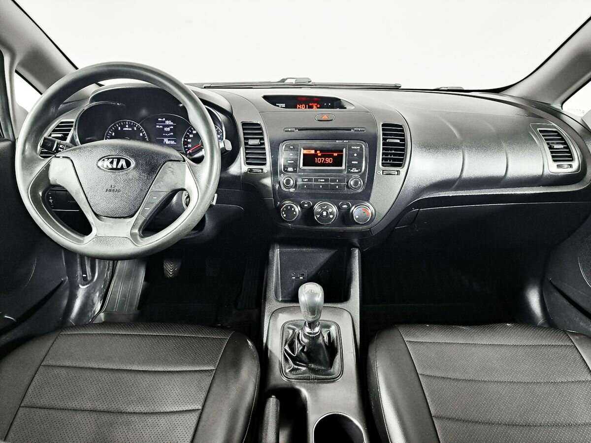 Kia Cerato с пробегом — 2013 год. Фото: #9