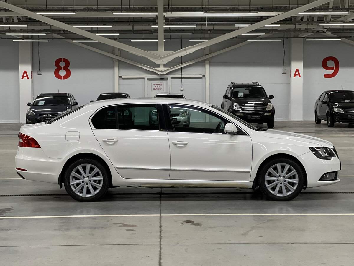 Skoda Superb с пробегом — 2014 год. Фото: #3