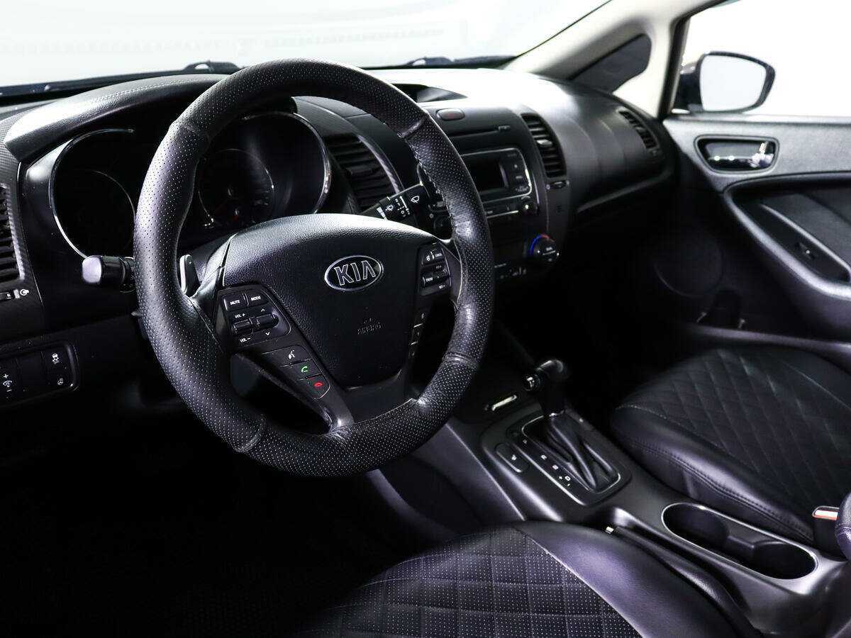 Kia Cerato с пробегом — 2014 год. Фото: #13