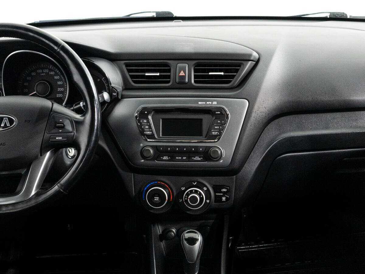 Kia Rio с пробегом — 2014 год. Фото: #13