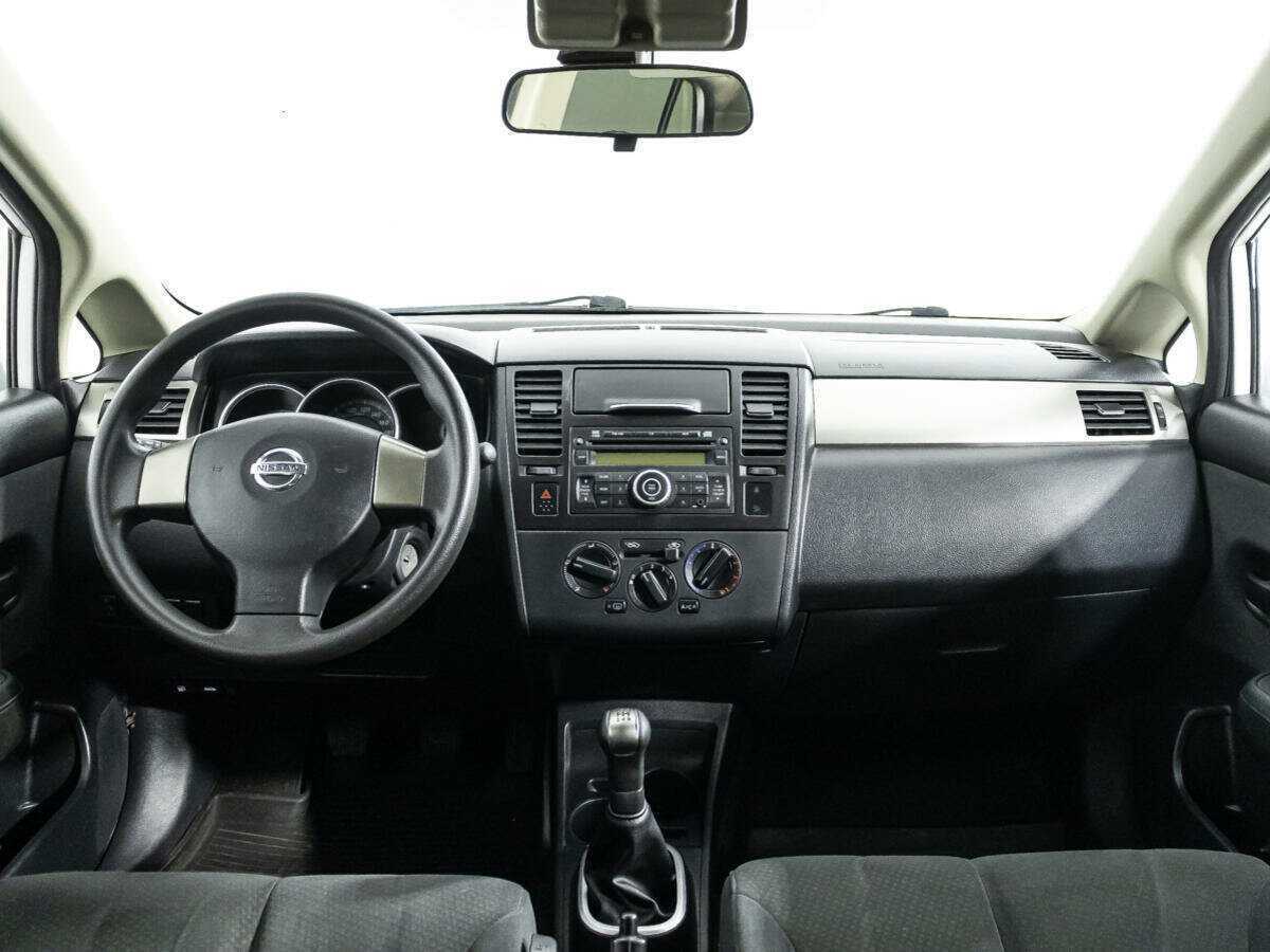 Nissan Tiida с пробегом — 2013 год. Фото: #12