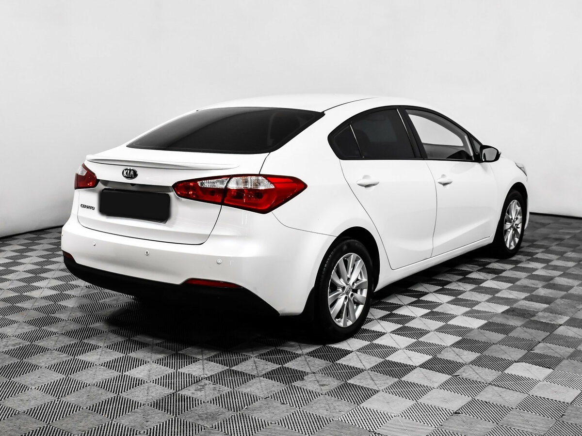 Kia Cerato с пробегом — 2013 год. Фото: #4