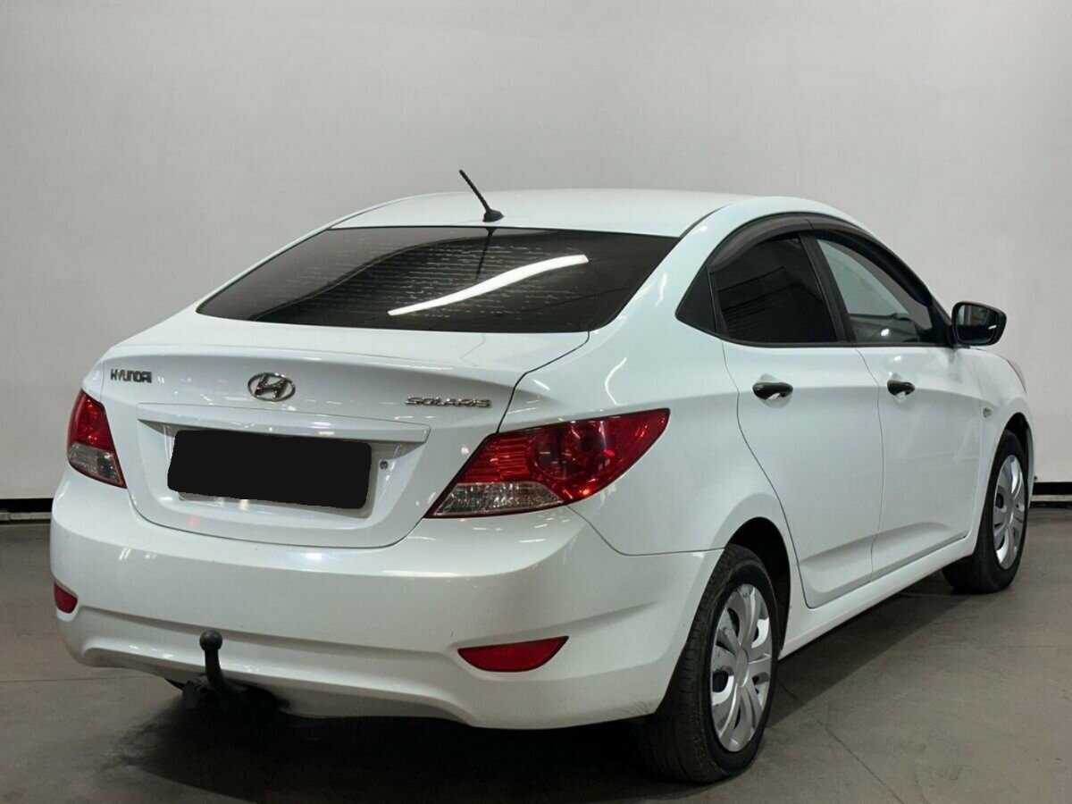 Hyundai Solaris с пробегом — 2014 год. Фото: #4