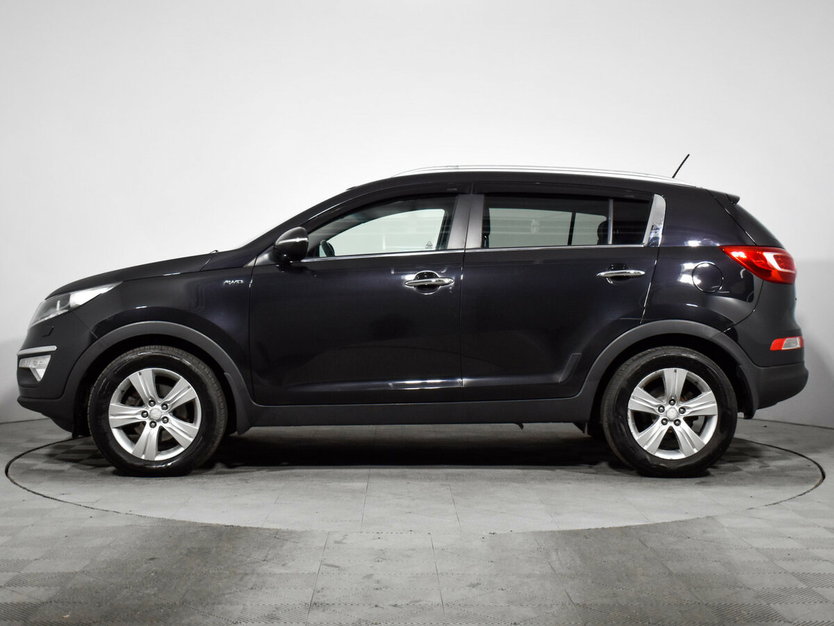 Kia Sportage с пробегом — 2012 год. Фото: #7