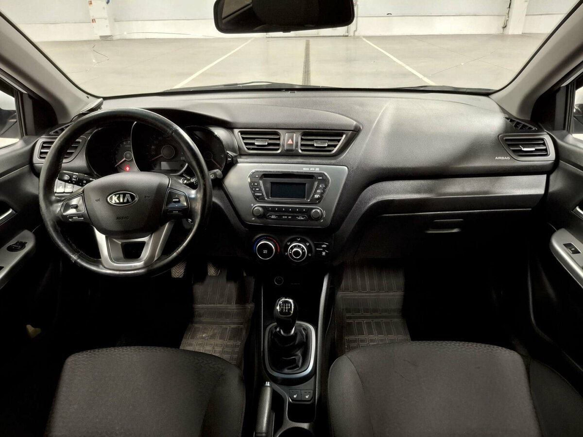 Kia Rio с пробегом — 2014 год. Фото: #13