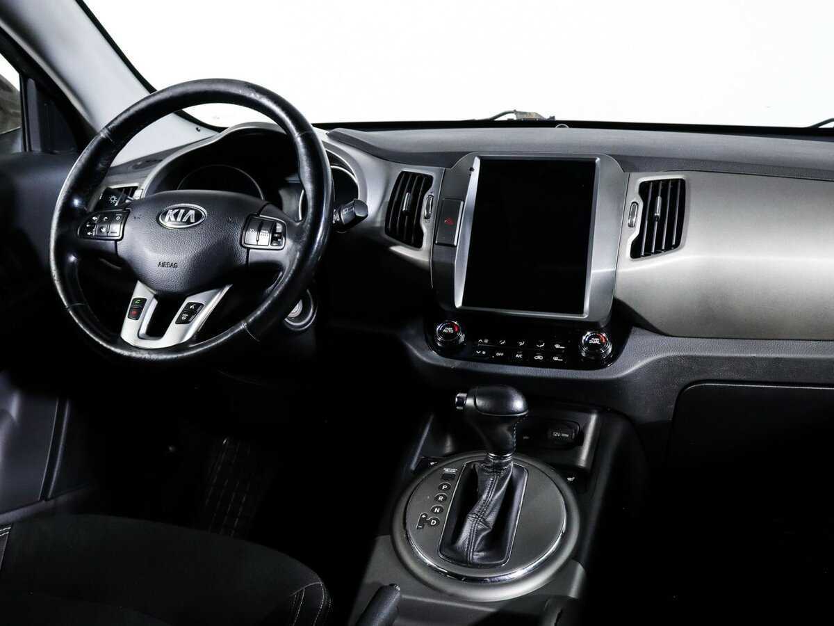 Kia Sportage с пробегом — 2014 год. Фото: #8