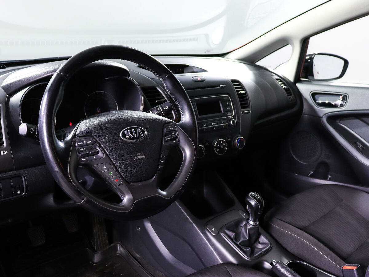 Kia Cerato с пробегом — 2014 год. Фото: #13