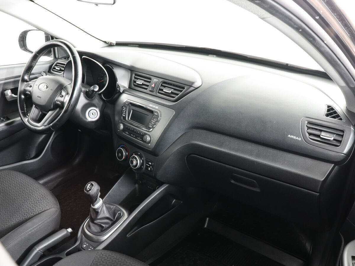 Kia Rio с пробегом — 2014 год. Фото: #9