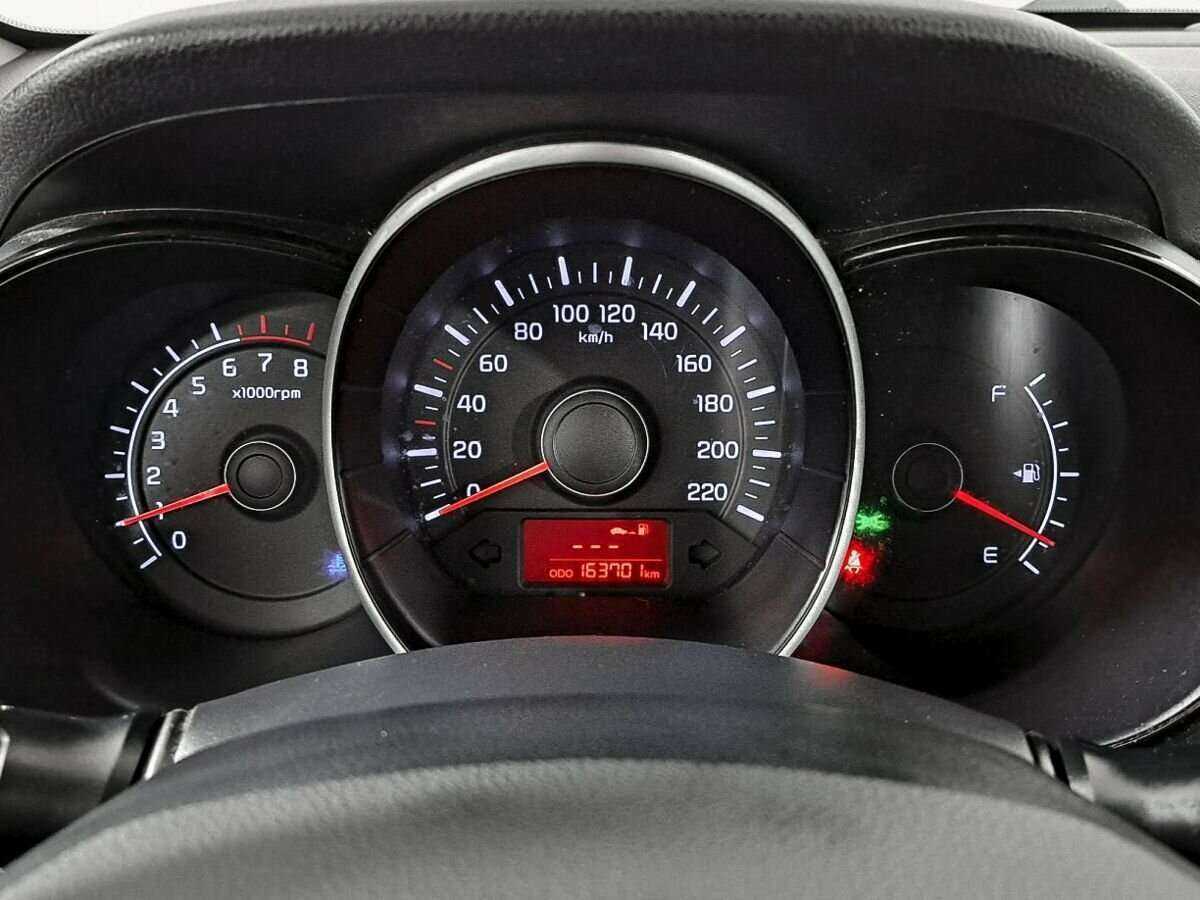 Kia Rio с пробегом — 2013 год. Фото: #12