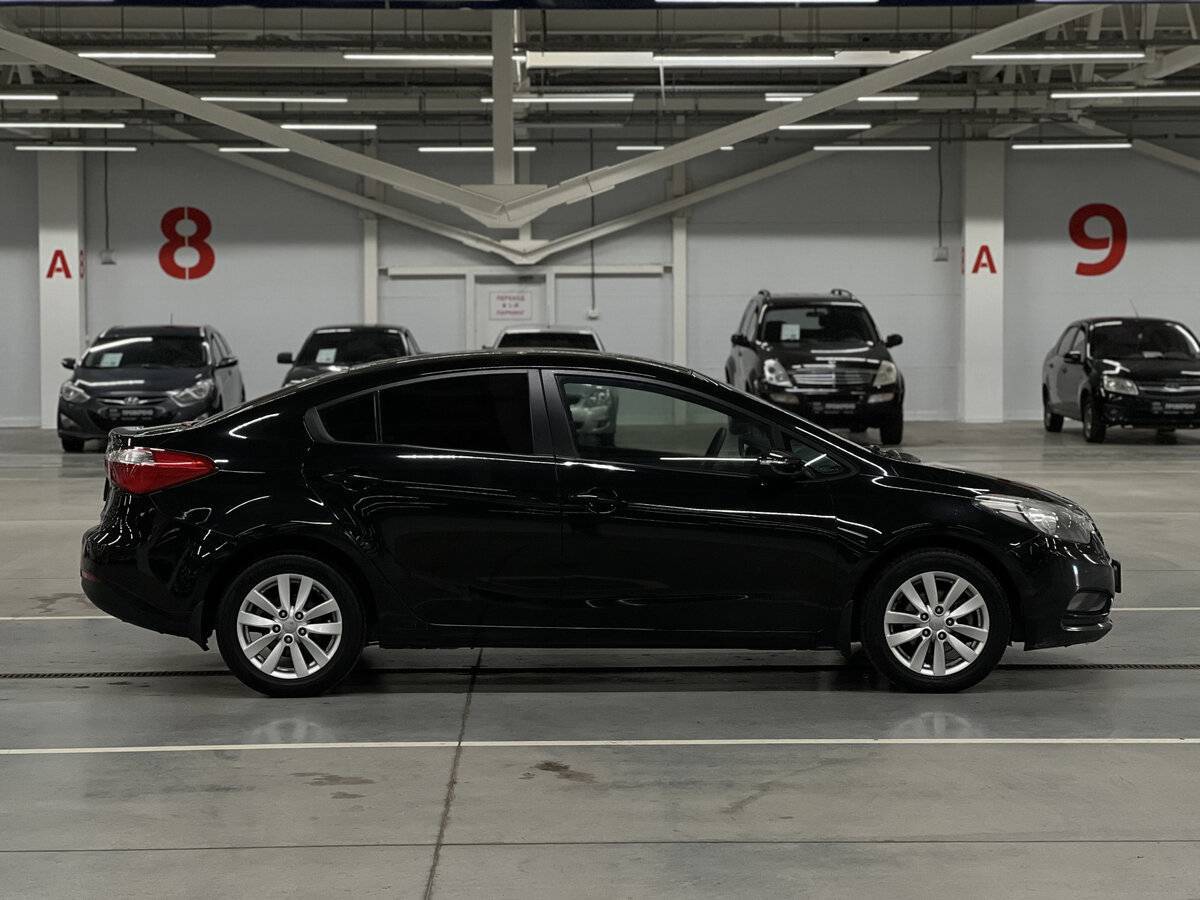 Kia Cerato с пробегом — 2014 год. Фото: #3