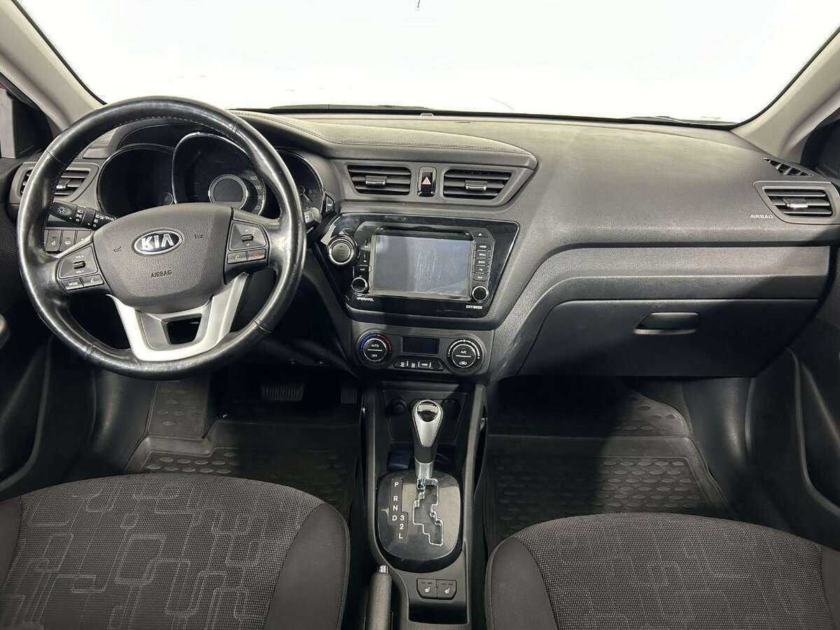 Kia Rio с пробегом — 2013 год. Фото: #6
