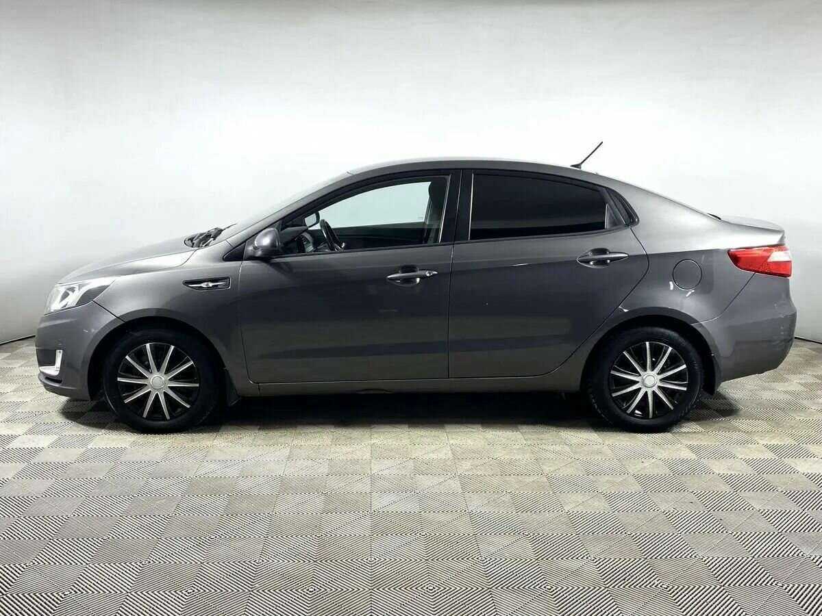 Kia Rio с пробегом — 2013 год. Фото: #5