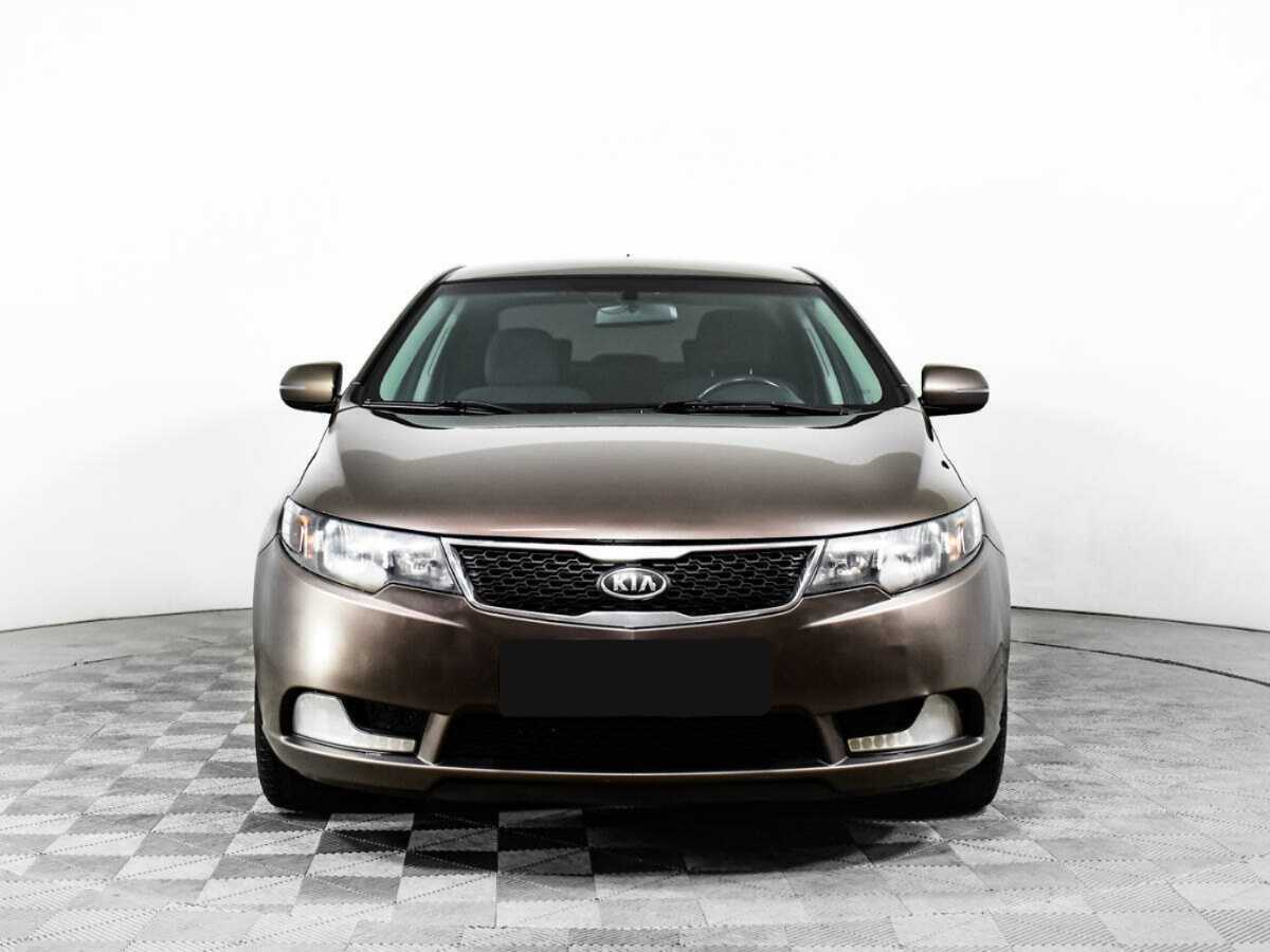Kia Cerato с пробегом — 2012 год. Фото: #1