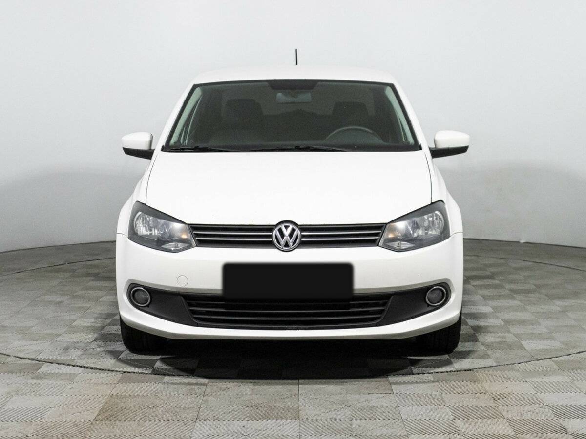 Volkswagen Polo с пробегом — 2013 год. Фото: #1