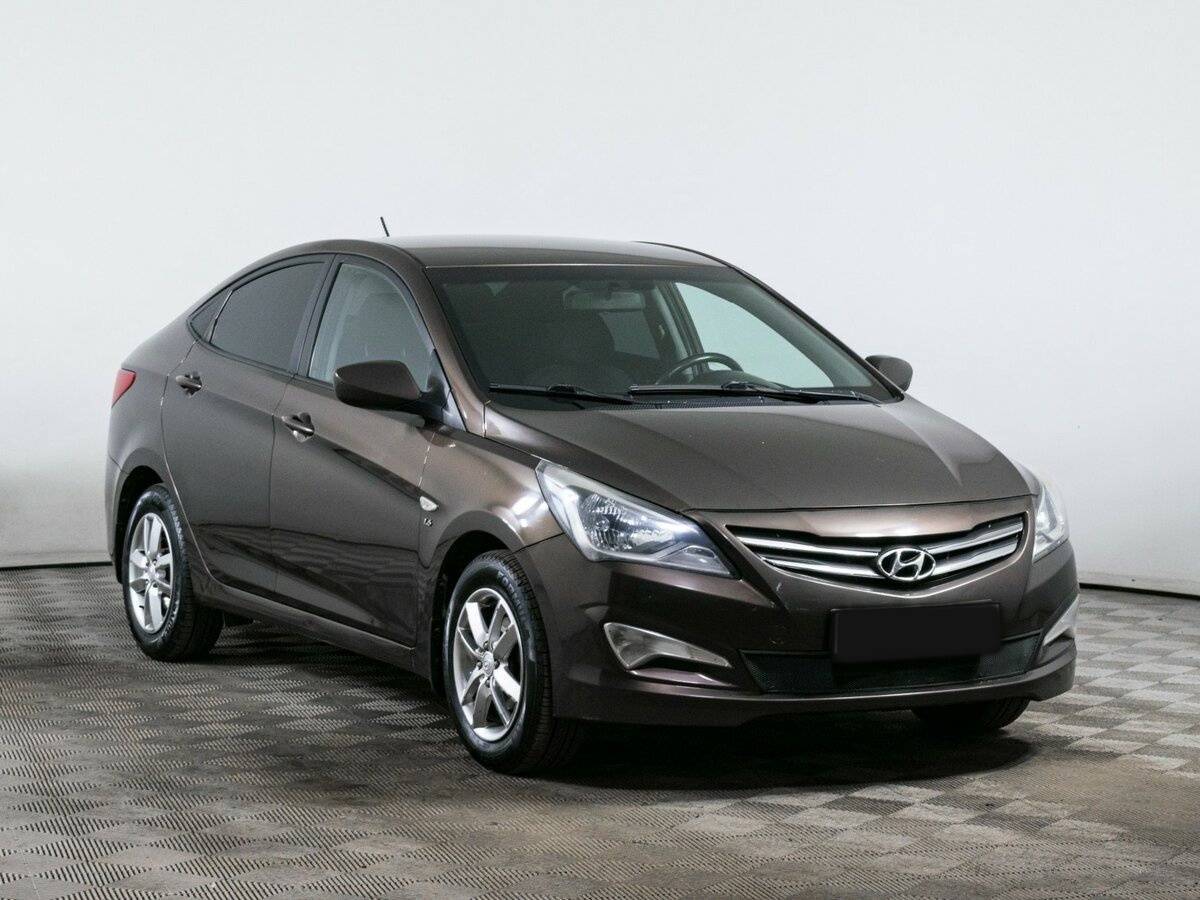 Hyundai Solaris с пробегом — 2014 год. Фото: #2