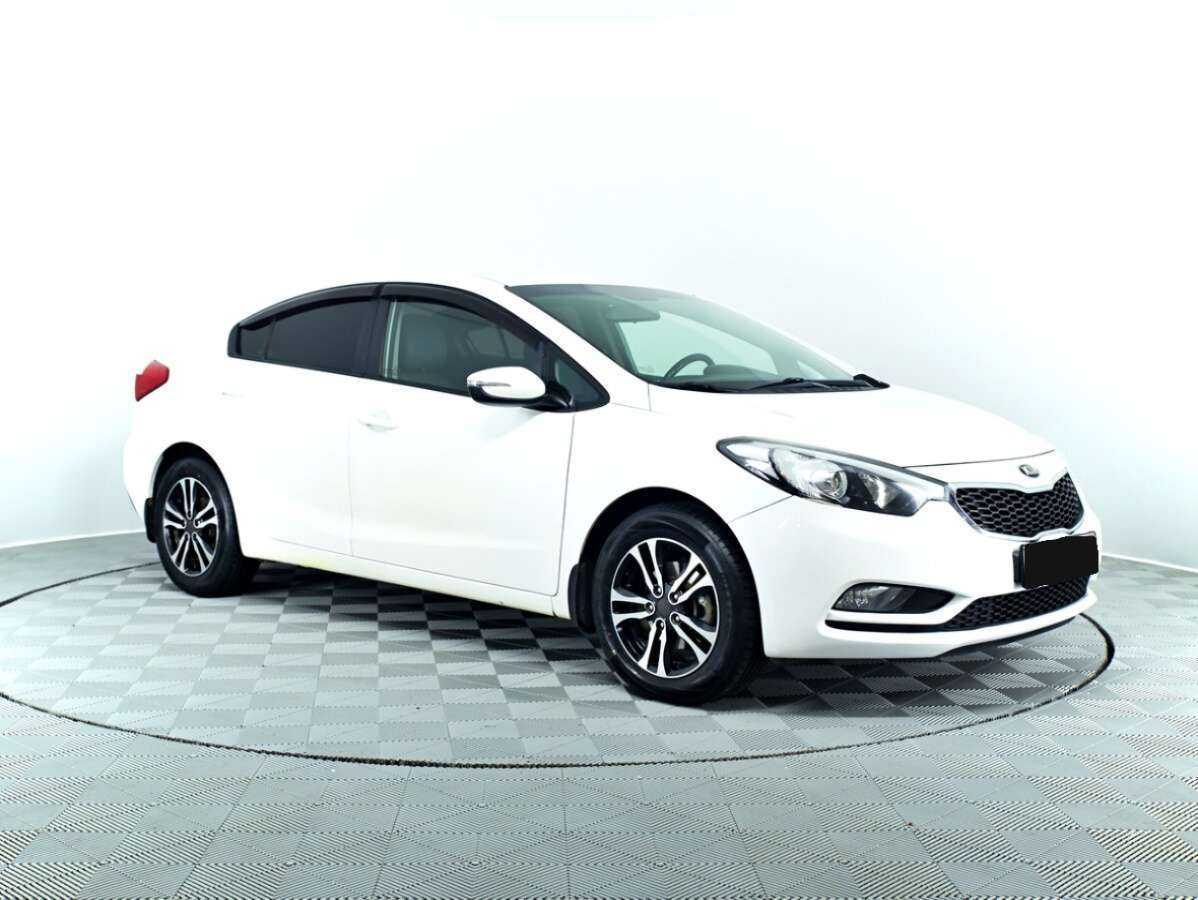 Kia Cerato с пробегом — 2014 год. Фото: #2