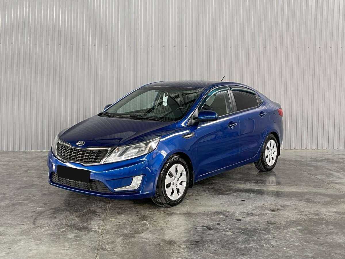 Kia Rio с пробегом — 2013 год. Фото: #0