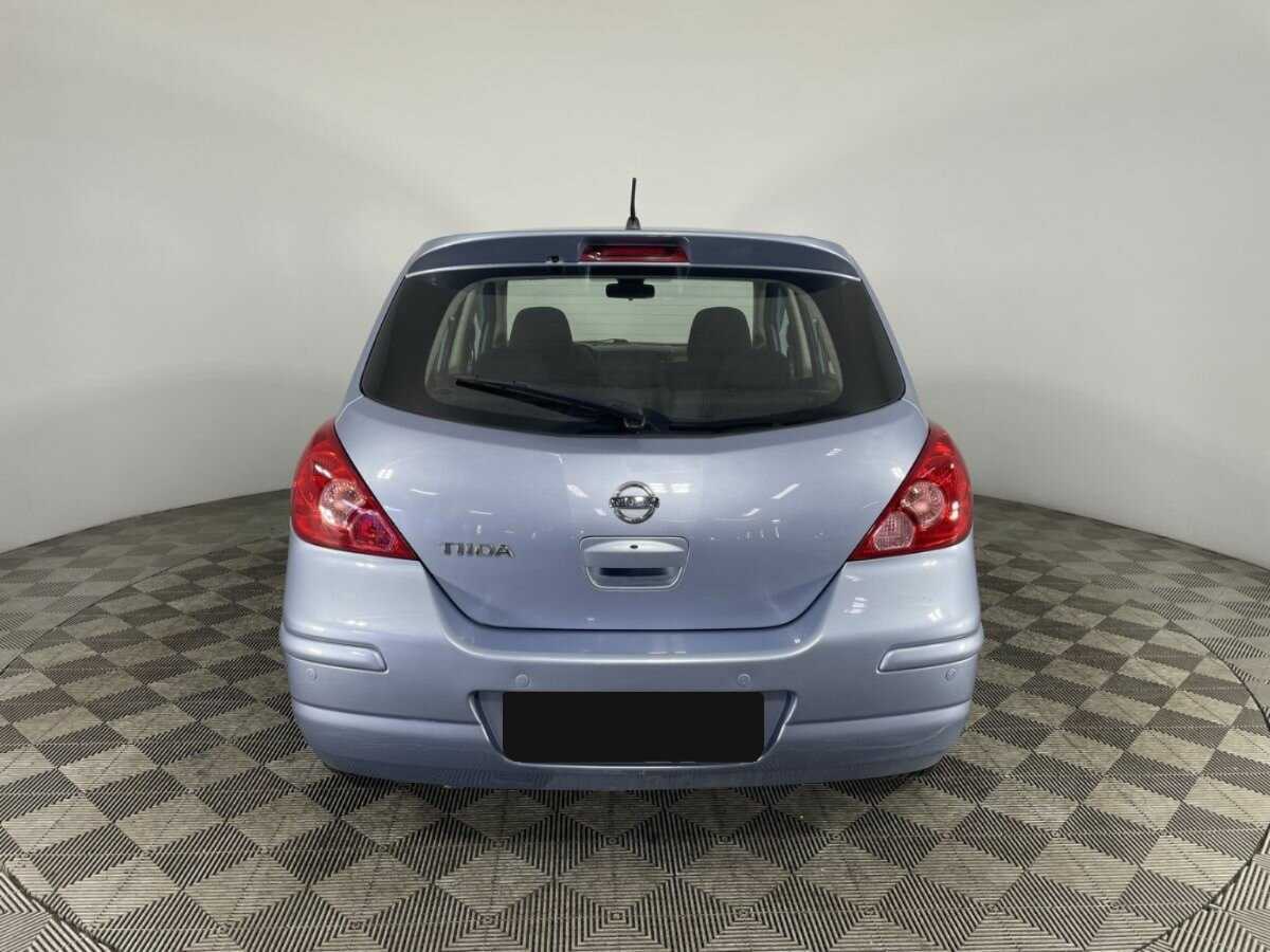 Nissan Tiida с пробегом — 2013 год. Фото: #2