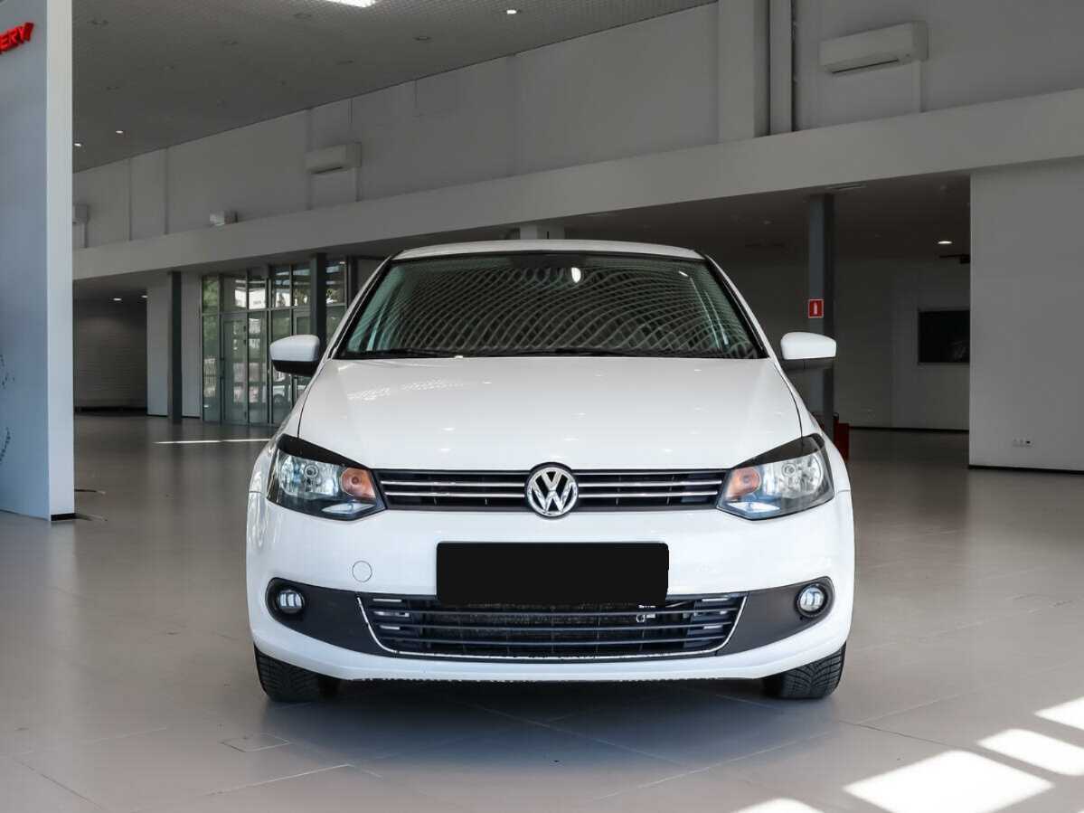 Volkswagen Polo с пробегом — 2013 год. Фото: #1