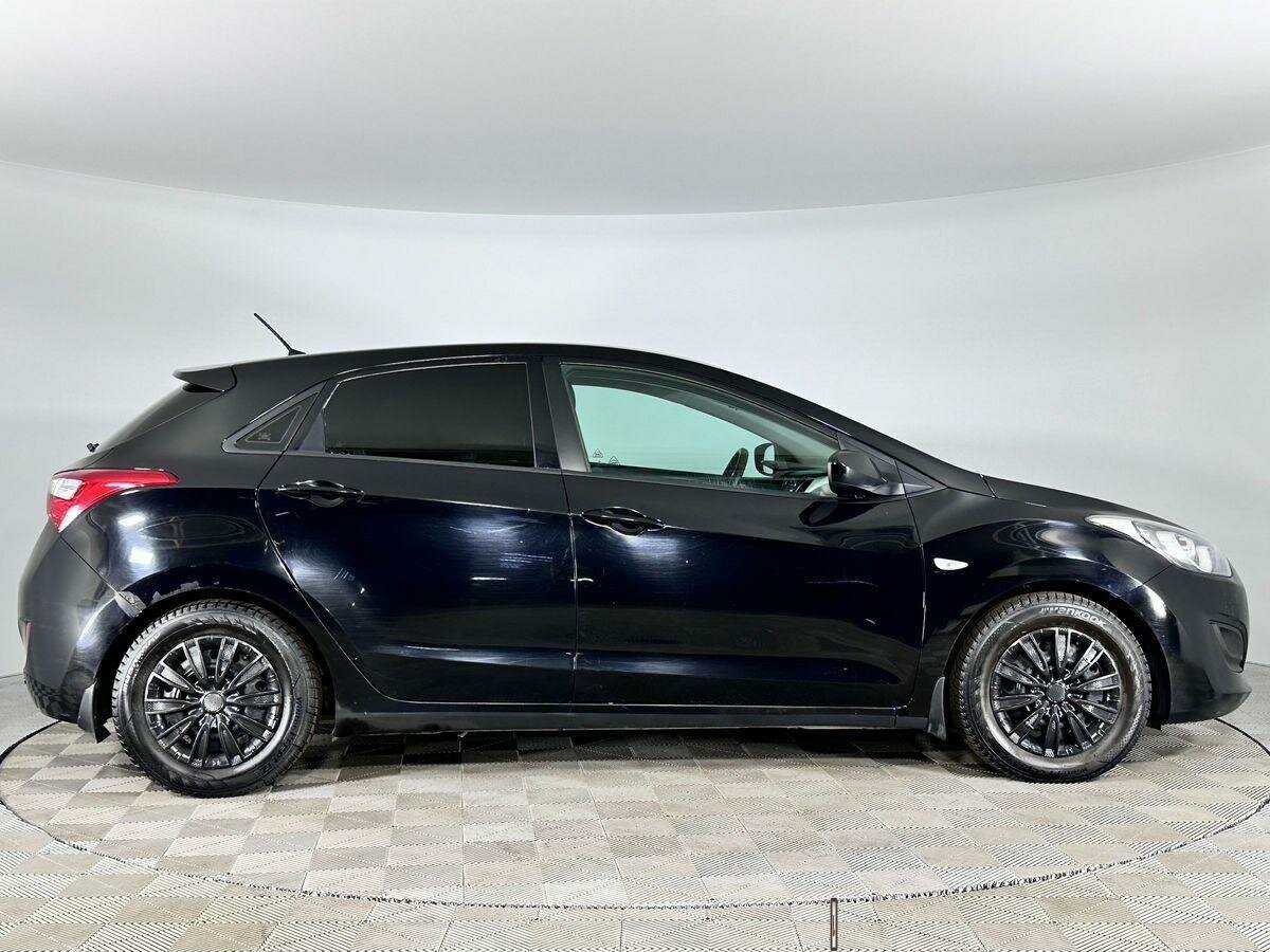 Hyundai i30 с пробегом — 2014 год. Фото: #4