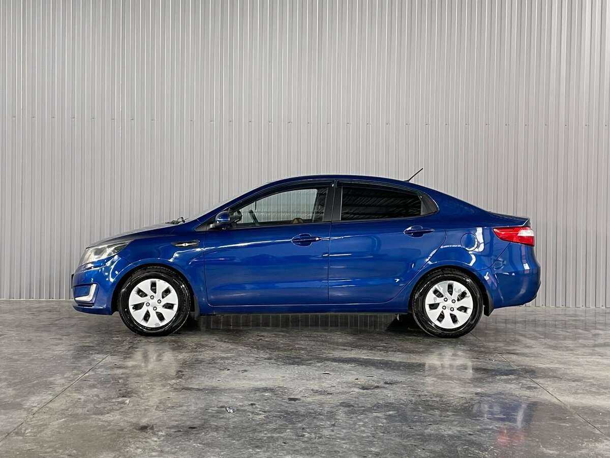 Kia Rio с пробегом — 2013 год. Фото: #7