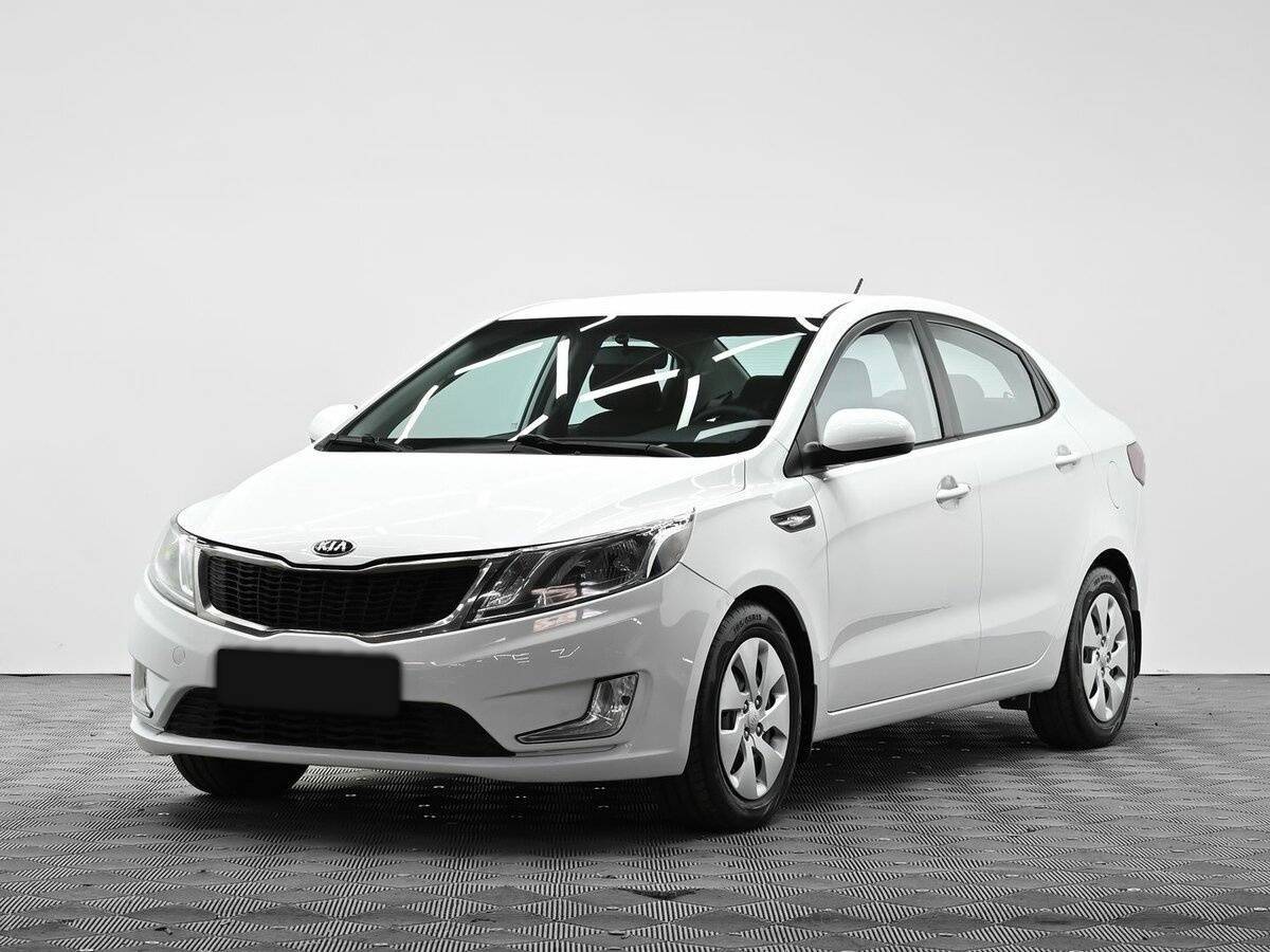 Kia Rio с пробегом — 2013 год. Фото: #0