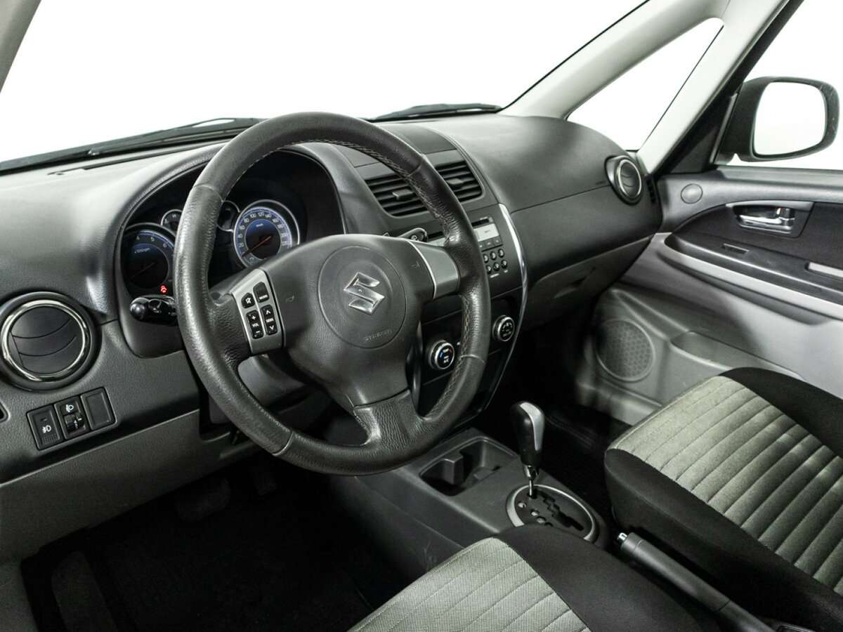 Suzuki SX4 с пробегом — 2013 год. Фото: #6
