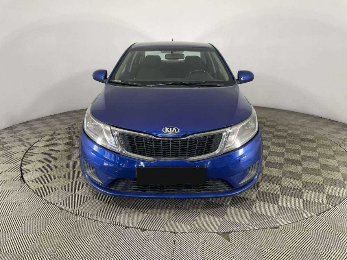 Kia Rio с пробегом — 2014 год. Фото: #1