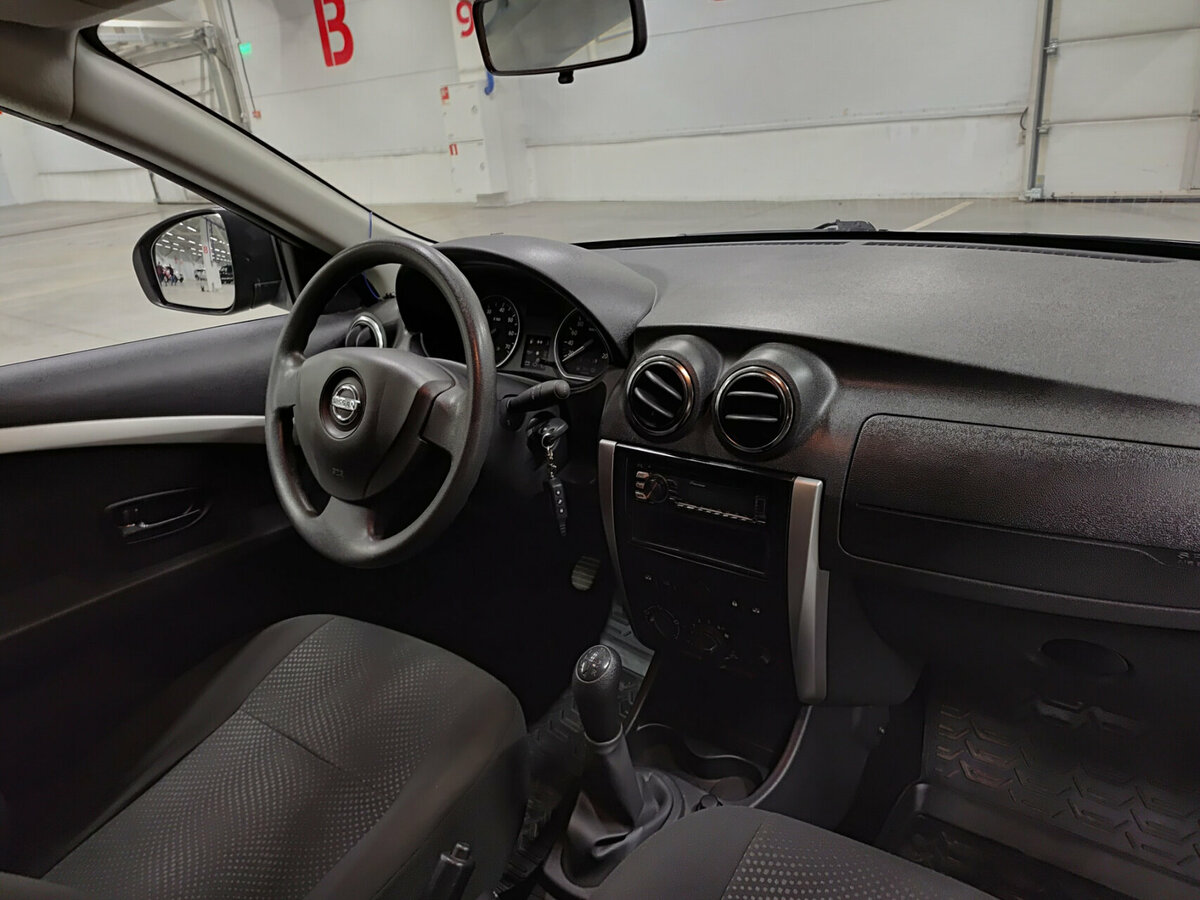 Nissan Almera с пробегом — 2015 год. Фото: #9