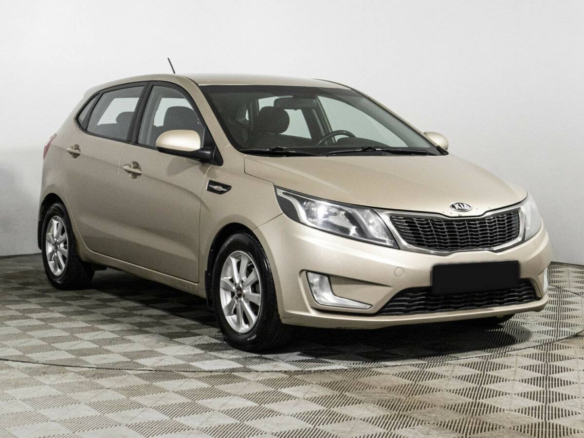 Kia Rio с пробегом — 2014 год. Фото: #2