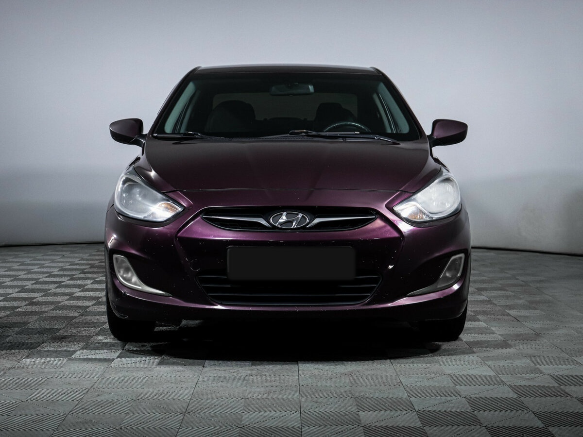 Hyundai Solaris с пробегом — 2013 год. Фото: #1