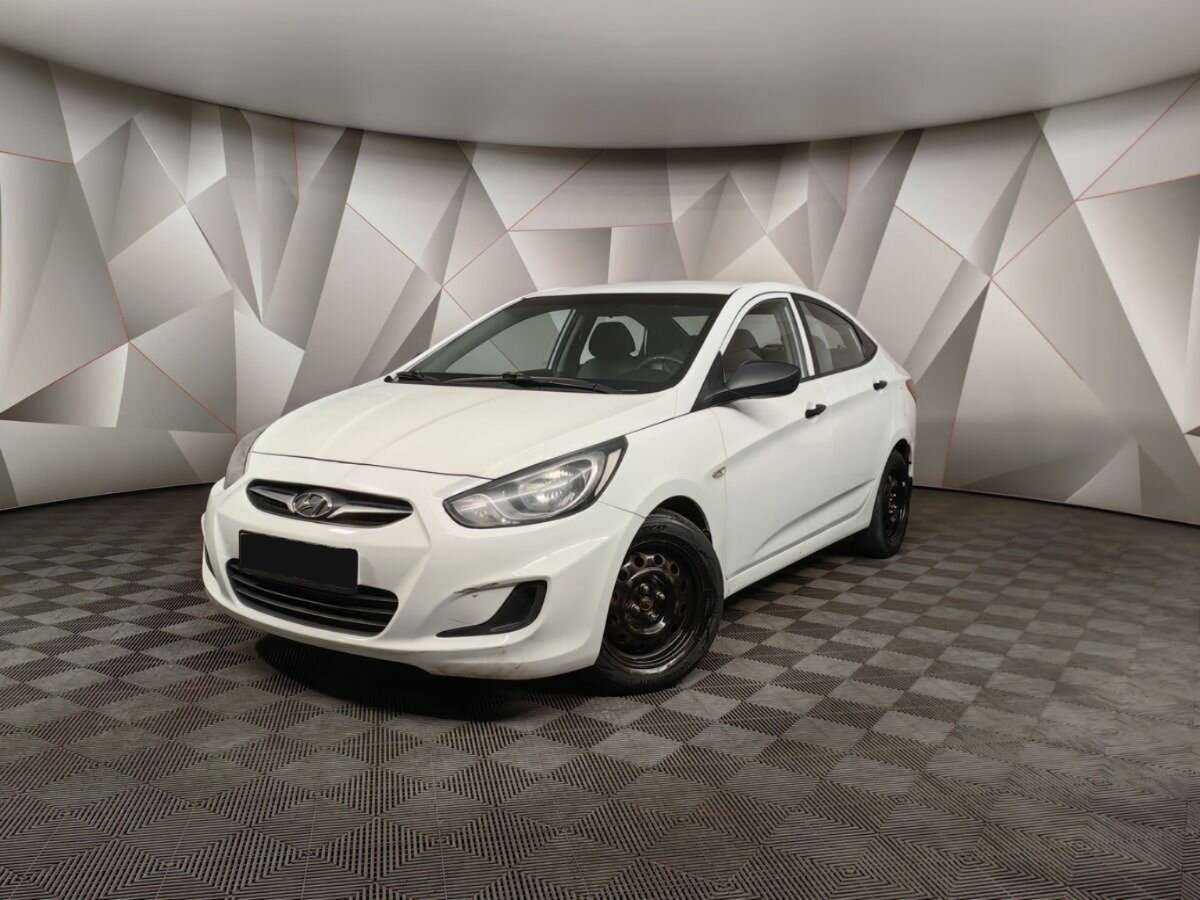 Hyundai Solaris с пробегом — 2013 год. Фото: #0