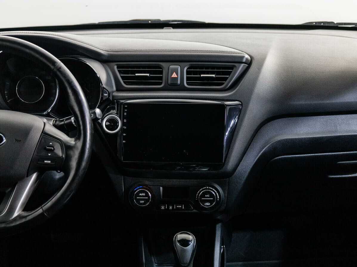 Kia Rio с пробегом — 2014 год. Фото: #12