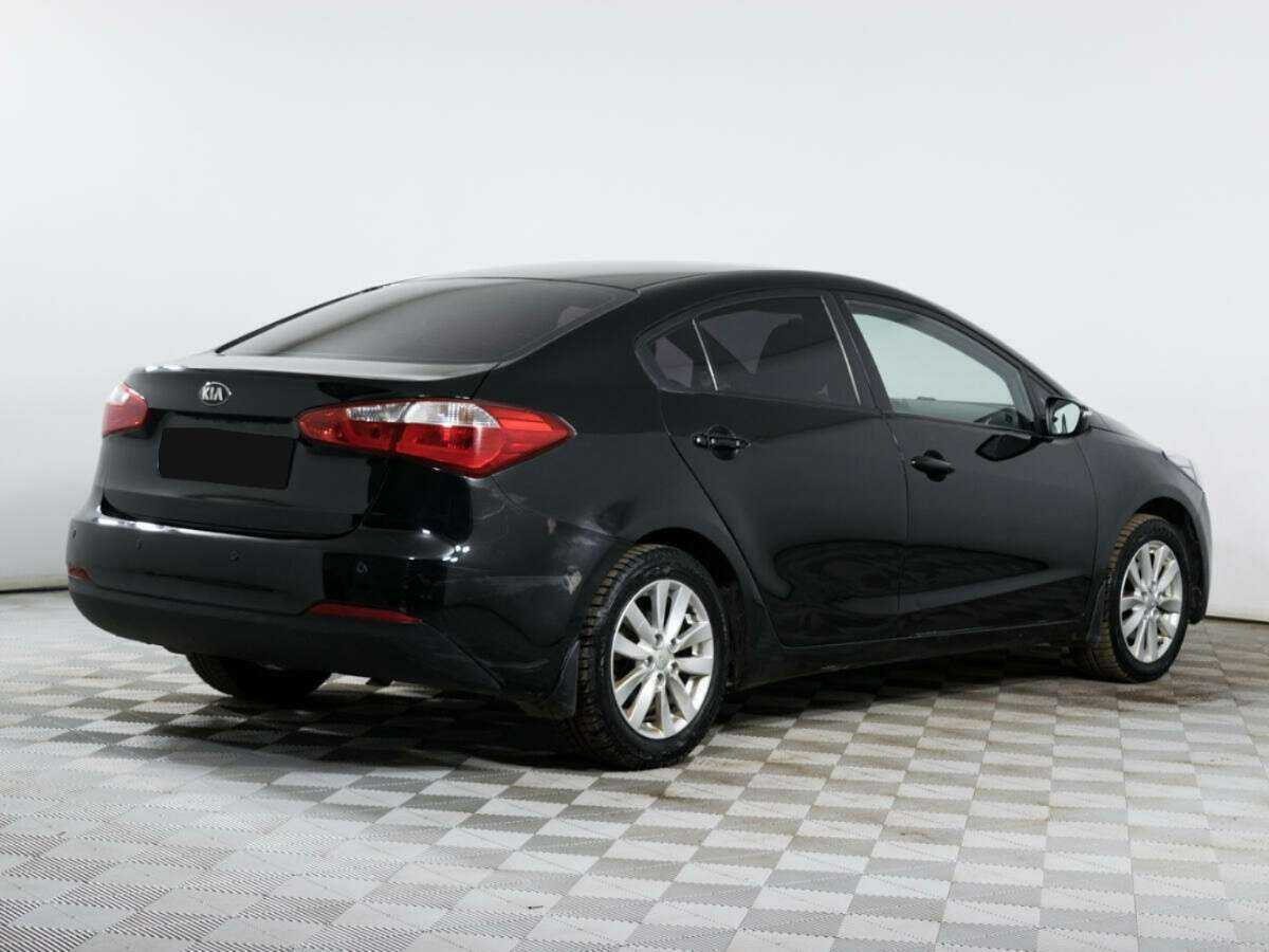 Kia Cerato с пробегом — 2014 год. Фото: #4