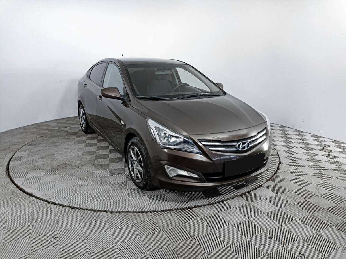 Hyundai Solaris с пробегом — 2015 год. Фото: #2