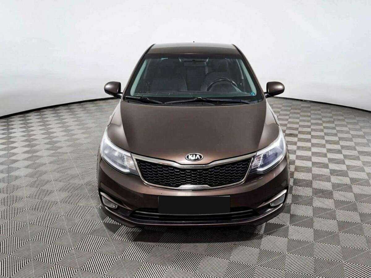 Kia Rio с пробегом — 2015 год. Фото: #1