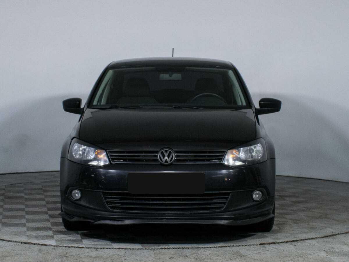 Volkswagen Polo с пробегом — 2014 год. Фото: #1